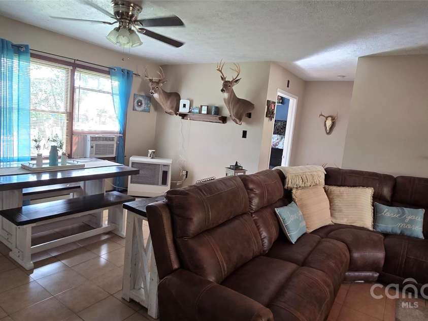 414 Pine Cove Road, Old Fort, NC 28762.  MLS# CAR4276158, YatesRealty ID 31977. Open floorplan