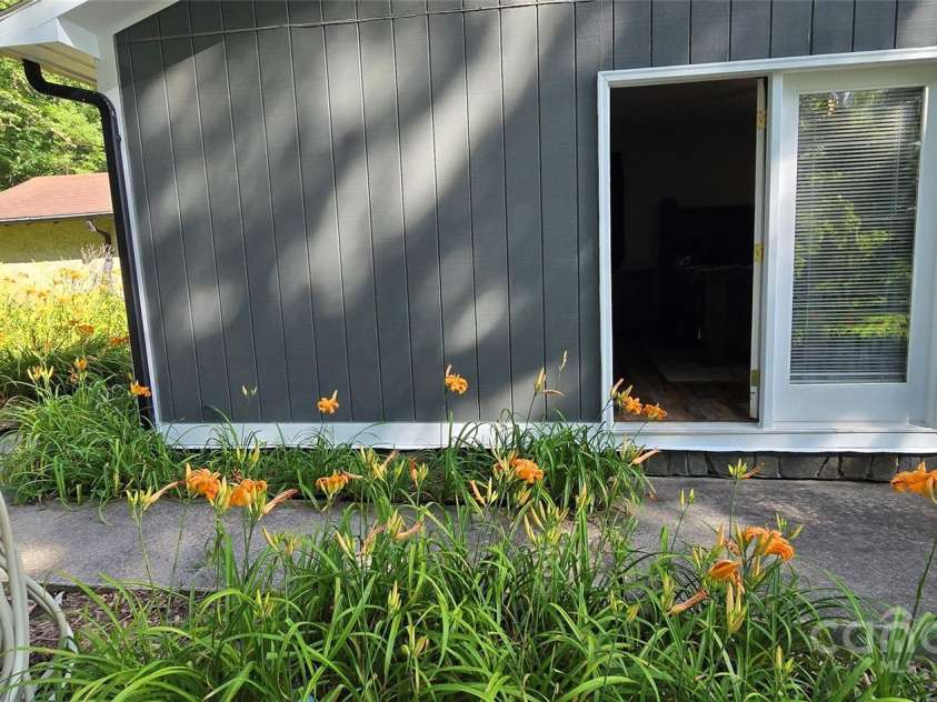 414 Pine Cove Road, Old Fort, NC 28762.  MLS# CAR4276158, YatesRealty ID 31977. Primary patio door