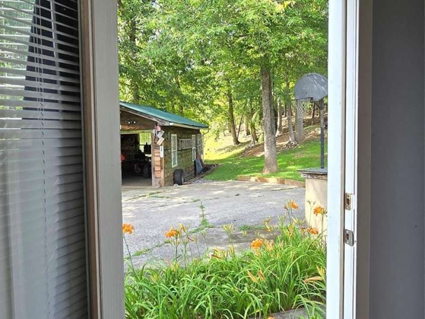 414 Pine Cove Road, Old Fort, NC 28762.  MLS# CAR4276158, YatesRealty ID 31977. Primary rear door