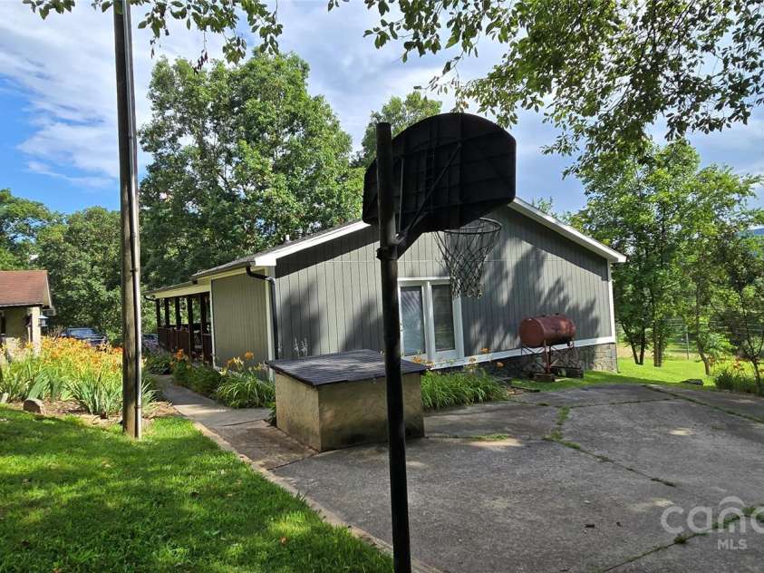 414 Pine Cove Road, Old Fort, NC 28762.  MLS# CAR4276158, YatesRealty ID 31977. Rear of home