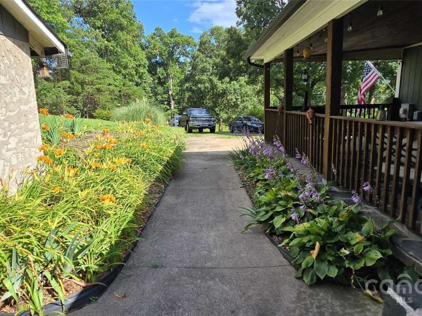 414 Pine Cove Road, Old Fort, NC 28762.  MLS# CAR4276158, YatesRealty ID 31977. Storage and porch