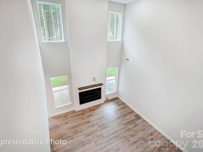 8011 James Query Road, Charlotte, NC 28227.  MLS# CAR4395378, YatesRealty ID 31979. 2nd floor open to below