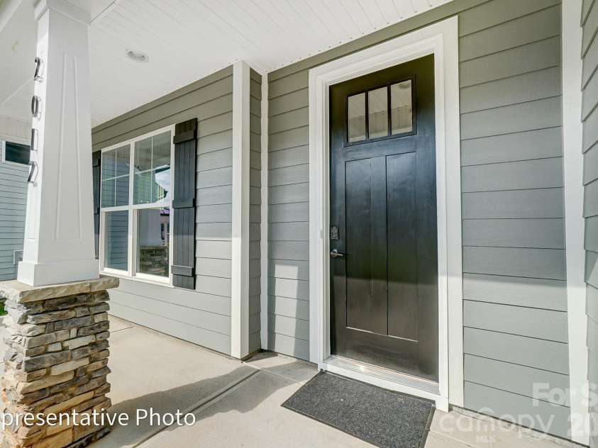 8011 James Query Road, Charlotte, NC 28227.  MLS# CAR4395378, YatesRealty ID 31979. Front Porch