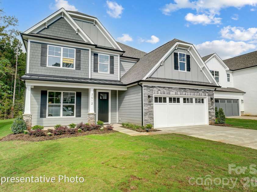 8011 James Query Road, Charlotte, NC 28227.  MLS# CAR4395378, YatesRealty ID 31979. Homesite 2 features a McDowell C floorplan