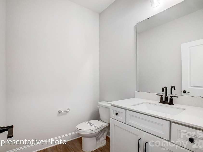 8011 James Query Road, Charlotte, NC 28227.  MLS# CAR4395378, YatesRealty ID 31979. Powder Bath