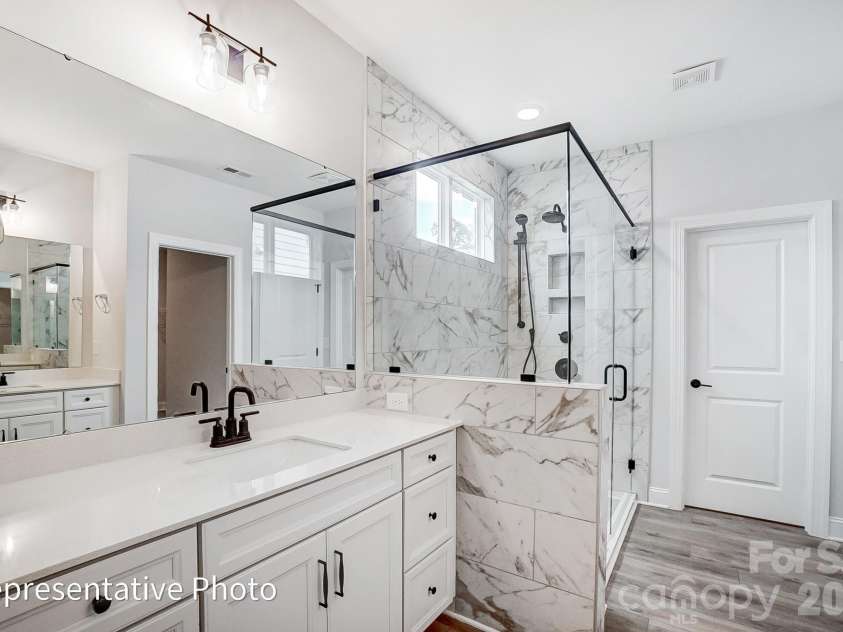 8011 James Query Road, Charlotte, NC 28227.  MLS# CAR4395378, YatesRealty ID 31979. Primary Bathroom