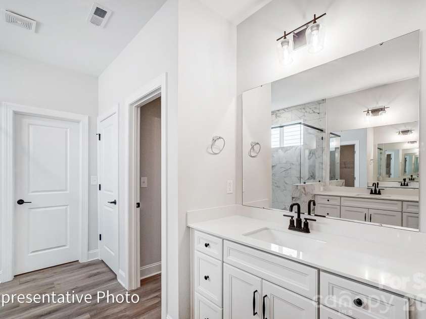 8011 James Query Road, Charlotte, NC 28227.  MLS# CAR4395378, YatesRealty ID 31979. Primary Bathroom
