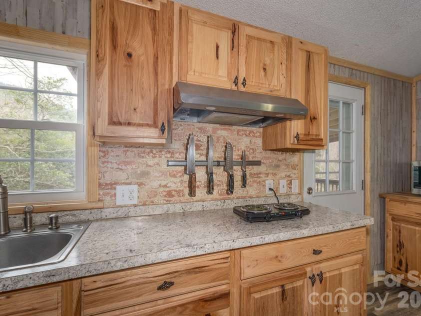 310 Sassafras Gap Lane, Brevard, NC 28712.  MLS# CAR4336681, YatesRealty ID 3198. 