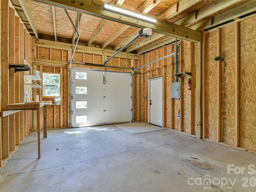 93 Old Stewart Road, Weaverville, NC 28787.  MLS# CAR4278171, YatesRealty ID 31980. 1 Car enclosed Garage