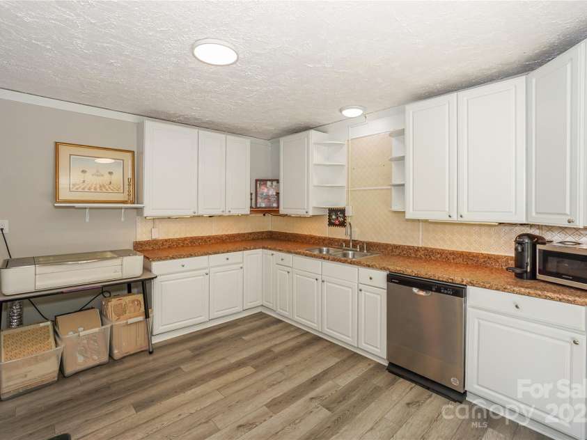 321 Cook Street, Mooresville, NC 28115.  MLS# CAR4282722, YatesRealty ID 31983. Kitchen in AD