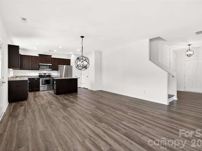 9013 Magnolia Lily Avenue, Charlotte, NC 28227.  MLS# CAR4392385, YatesRealty ID 31988. Open concept kitchen and living space