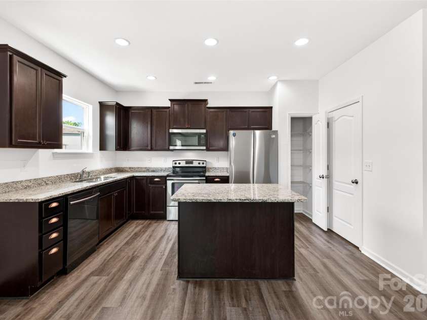 9013 Magnolia Lily Avenue, Charlotte, NC 28227.  MLS# CAR4392385, YatesRealty ID 31988. Open concept kitchen and living space