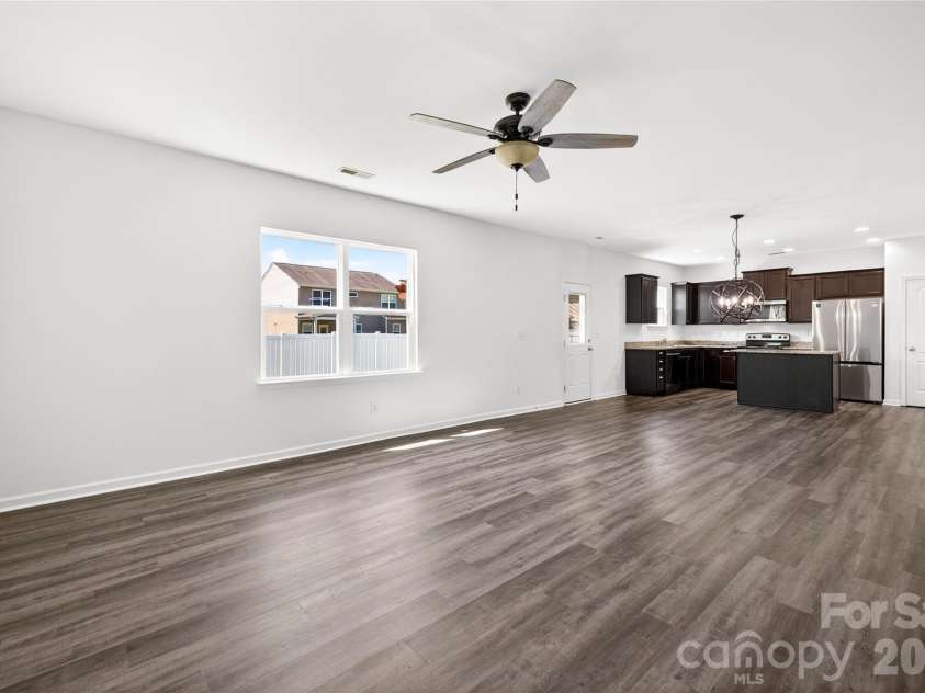 9013 Magnolia Lily Avenue, Charlotte, NC 28227.  MLS# CAR4392385, YatesRealty ID 31988. Open concept kitchen and living space