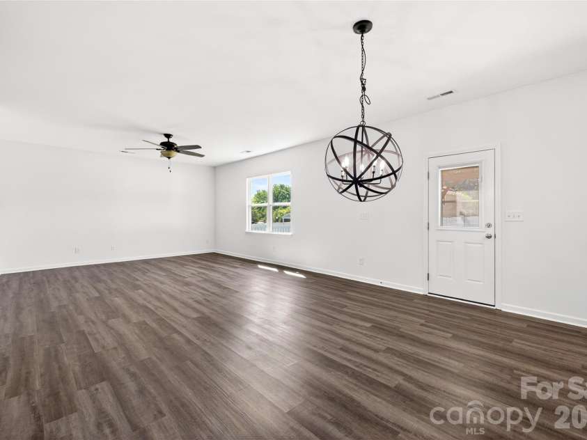 9013 Magnolia Lily Avenue, Charlotte, NC 28227.  MLS# CAR4392385, YatesRealty ID 31988. Open concept kitchen and living space