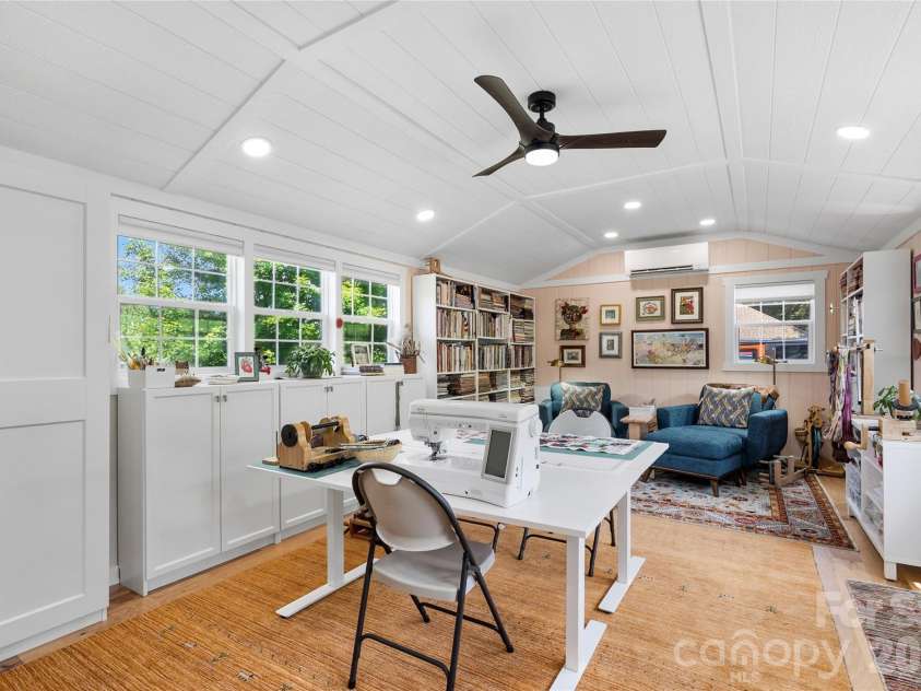 34 Justice Drive, Leicester, NC 28748.  MLS# CAR4394117, YatesRealty ID 31989. Detached studio with hardwood flooring