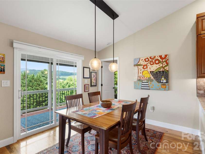 34 Justice Drive, Leicester, NC 28748.  MLS# CAR4394117, YatesRealty ID 31989. Dining area with custom pendant lighting 