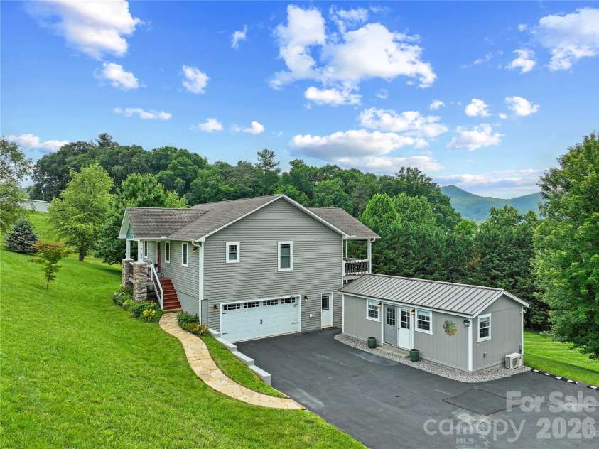 34 Justice Drive, Leicester, NC 28748.  MLS# CAR4394117, YatesRealty ID 31989. Expansive property, pastoral setting and pristine home with detached studio 