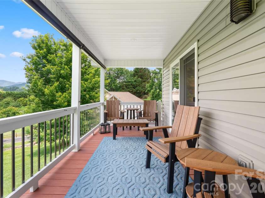 34 Justice Drive, Leicester, NC 28748.  MLS# CAR4394117, YatesRealty ID 31989. Retractable sunshades come with home