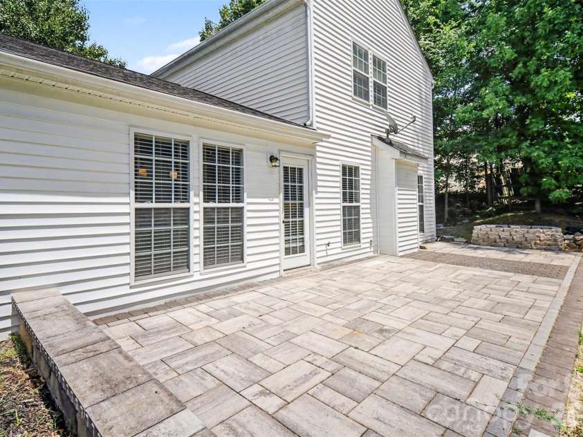 1131 Morning Glory Drive, Charlotte, NC 28262.  MLS# CAR4394711, YatesRealty ID 31990. Back Patio