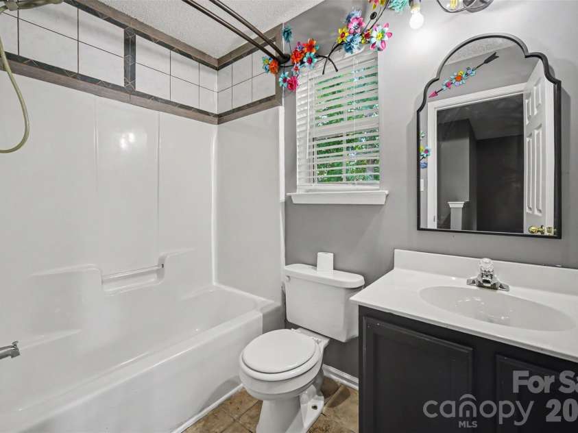 1131 Morning Glory Drive, Charlotte, NC 28262.  MLS# CAR4394711, YatesRealty ID 31990. Hallway Bathroom