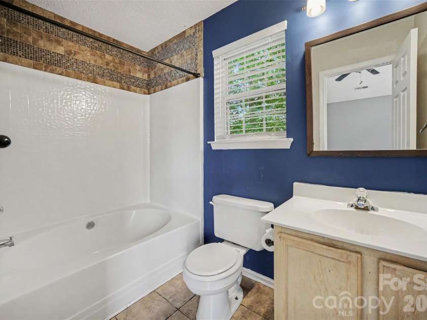 1131 Morning Glory Drive, Charlotte, NC 28262.  MLS# CAR4394711, YatesRealty ID 31990. Master Bathroom
