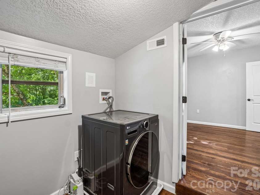3 View Street, Asheville, NC 28803.  MLS# CAR4383178, YatesRealty ID 31991. Closet with washer/dryer