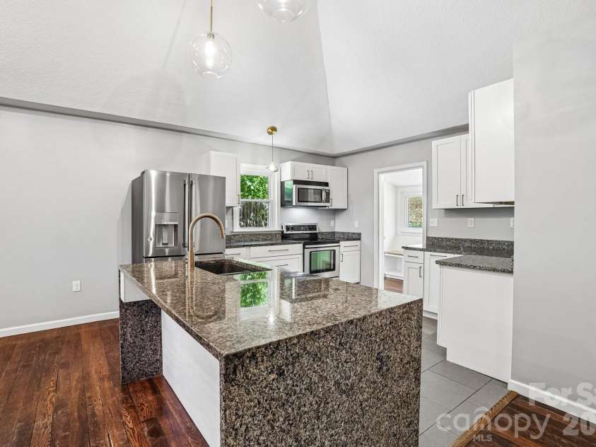 3 View Street, Asheville, NC 28803.  MLS# CAR4383178, YatesRealty ID 31991. Kitchen from living room