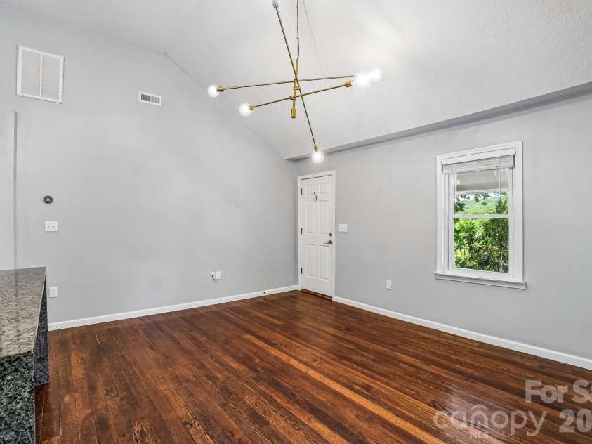 3 View Street, Asheville, NC 28803.  MLS# CAR4383178, YatesRealty ID 31991. Living room from kitchen island