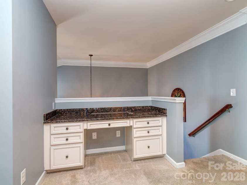 1839 Royal Gorge Avenue, Charlotte, NC 28210.  MLS# CAR4389326, YatesRealty ID 31992. Upstairs custom desk built-in.