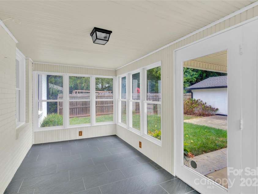 824 Davie Avenue, Statesville, NC 28677.  MLS# CAR4288136, YatesRealty ID 31997. Sunroom