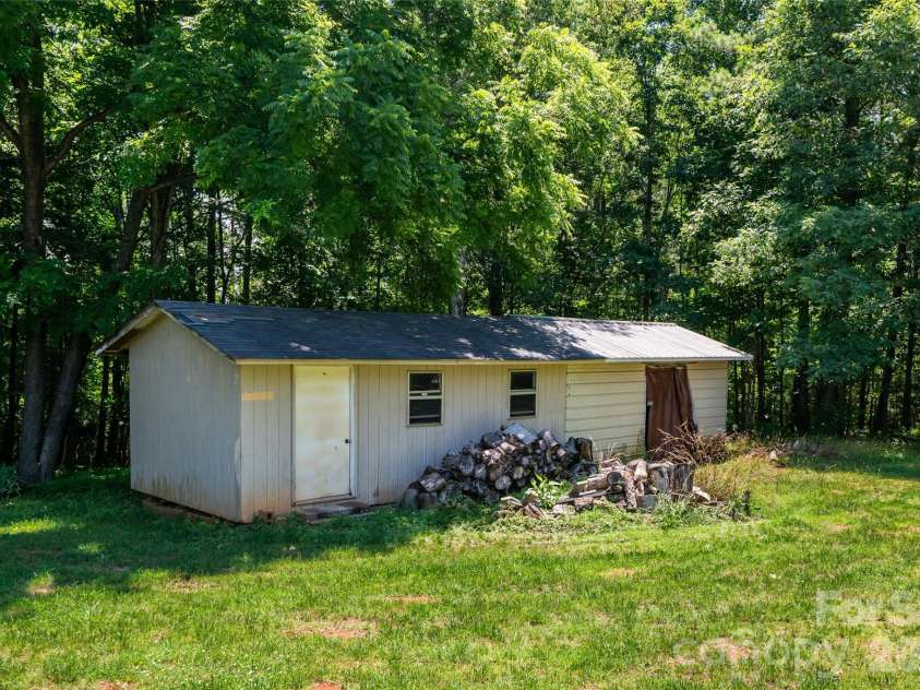 2800 Coxe Road, Tryon, NC 28782.  MLS# CAR4394414, YatesRealty ID 31998. 