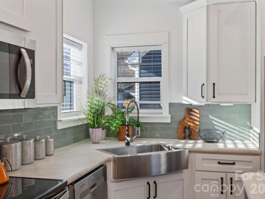 205 Southern Charm Road, Arden, NC 28704.  MLS# CAR4327536, YatesRealty ID 3200. Sunny corner perfect for plants