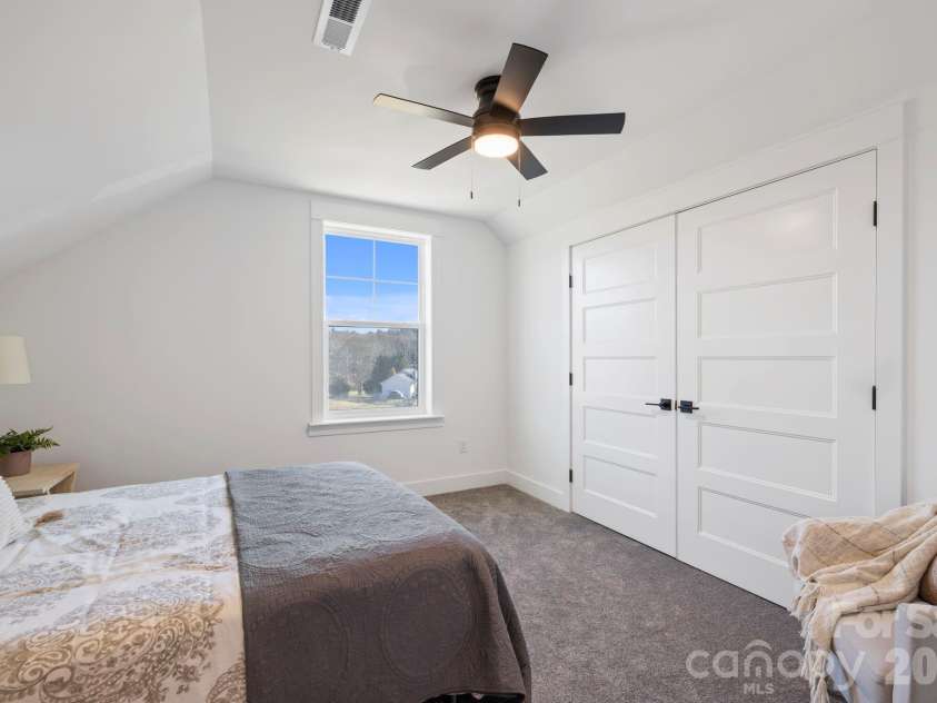 205 Southern Charm Road, Arden, NC 28704.  MLS# CAR4327536, YatesRealty ID 3200. Upper Level Bedroom 2
