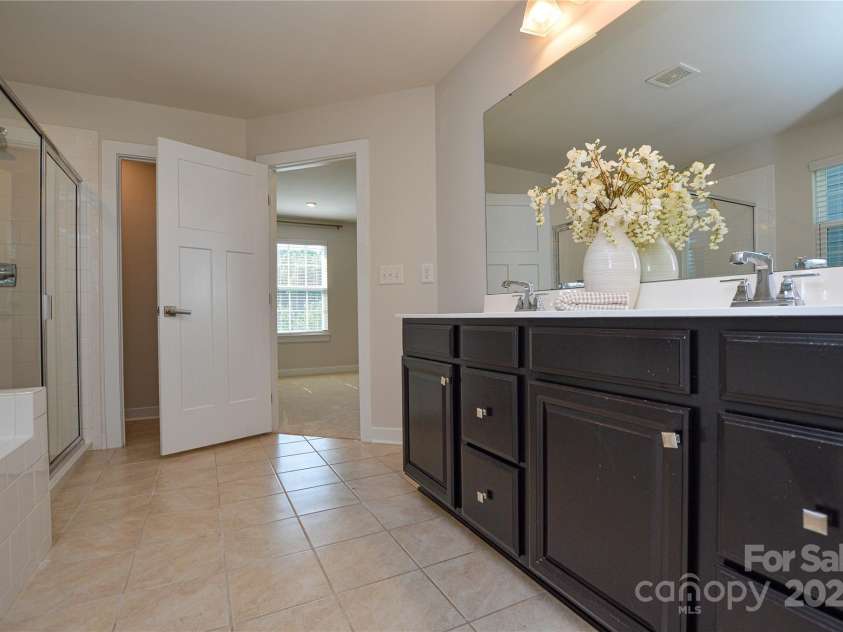 128 Tetcott Street, Mooresville, NC 28115.  MLS# CAR4283720, YatesRealty ID 32002. Primary En Suite