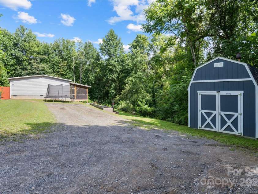 113 Hidden Forest Estate, Candler, NC 28715.  MLS# CAR4288651, YatesRealty ID 32003. 