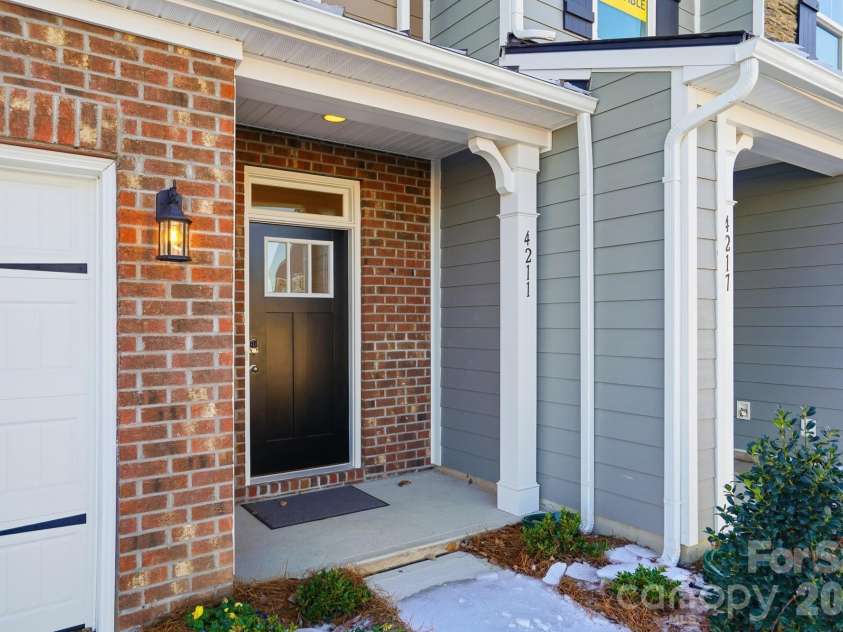 4211 Black Court, Harrisburg, NC 28075.  MLS# CAR4237204, YatesRealty ID 32013. Covered front porch