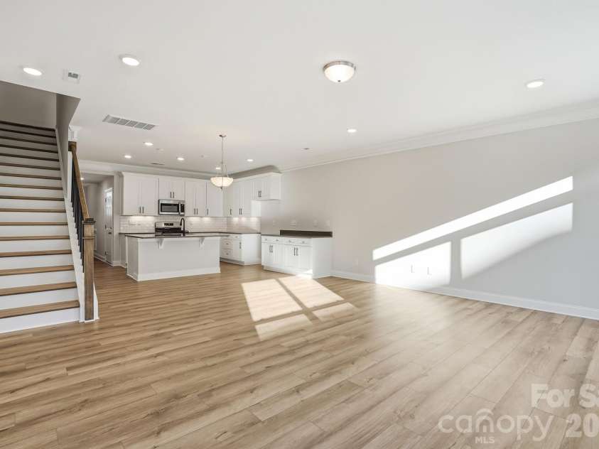 4211 Black Court, Harrisburg, NC 28075.  MLS# CAR4237204, YatesRealty ID 32013. EVP flooring throughout the main