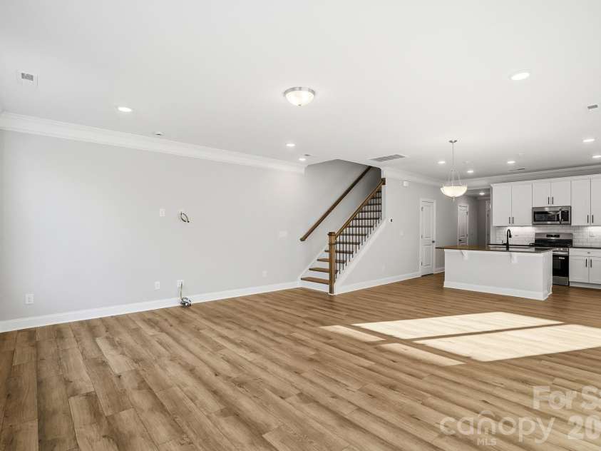 4211 Black Court, Harrisburg, NC 28075.  MLS# CAR4237204, YatesRealty ID 32013. EVP flooring throughout the main