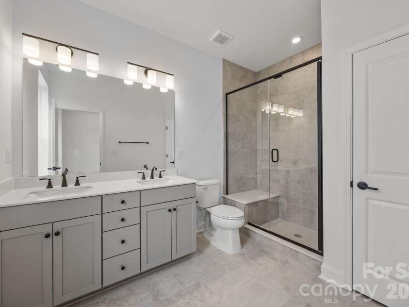 3225 Drift Street, Charlotte, NC 28278.  MLS# CAR4263768, YatesRealty ID 32022. Second suite bath