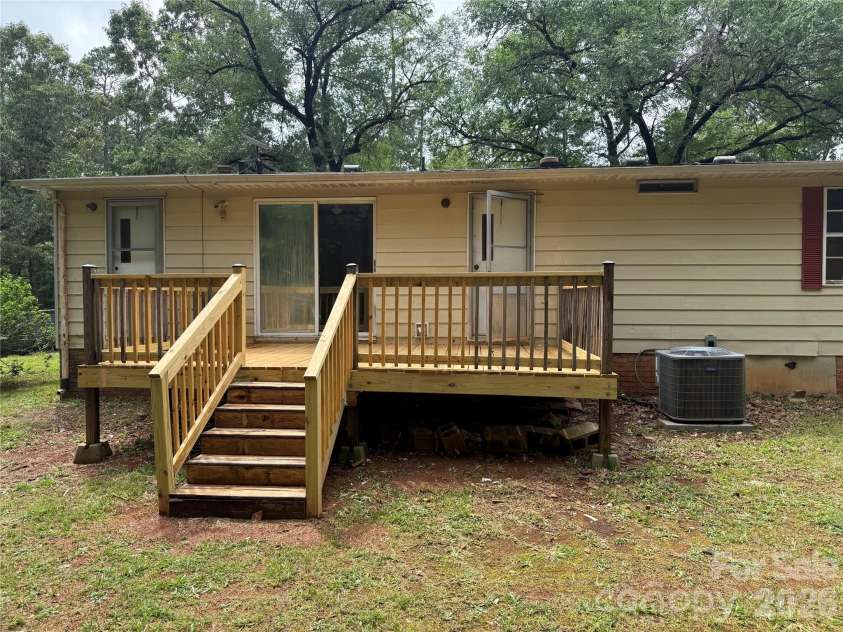211 Corry Lane, Bostic, NC 28018.  MLS# CAR4392123, YatesRealty ID 32023. Large back deck