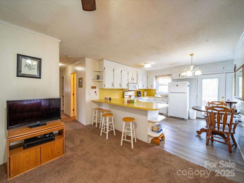 36533 South Stanly School Road, Norwood, NC 28128.  MLS# CAR4228602, YatesRealty ID 3203. Living room/ Kitchen