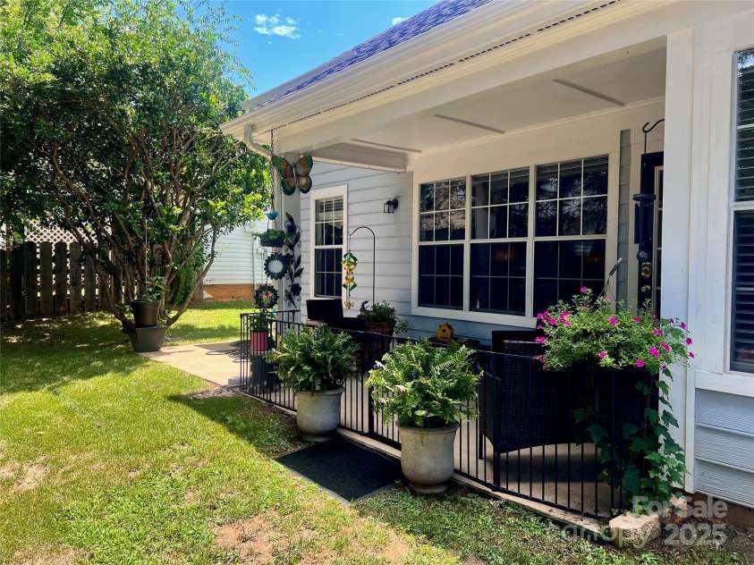 113 Indian Paint Brush Drive, Mooresville, NC 28115.  MLS# CAR4285325, YatesRealty ID 32030. Covered patio