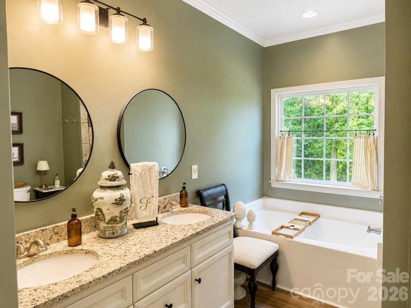 309 Godfrey Street, Pageland, SC 29728.  MLS# CAR4391585, YatesRealty ID 32034. Primary bath with granite and dual sinks