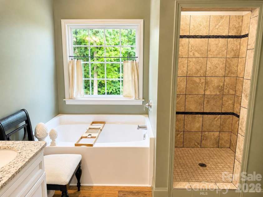 309 Godfrey Street, Pageland, SC 29728.  MLS# CAR4391585, YatesRealty ID 32034. Separate soaking tub and tiled shower