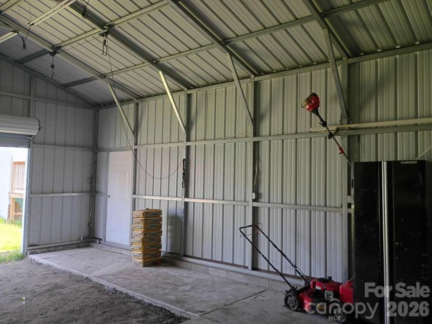 802 Canal Road, Lockhart, SC 29364.  MLS# CAR4392852, YatesRealty ID 32038. Detached 16 x 20 garage interior