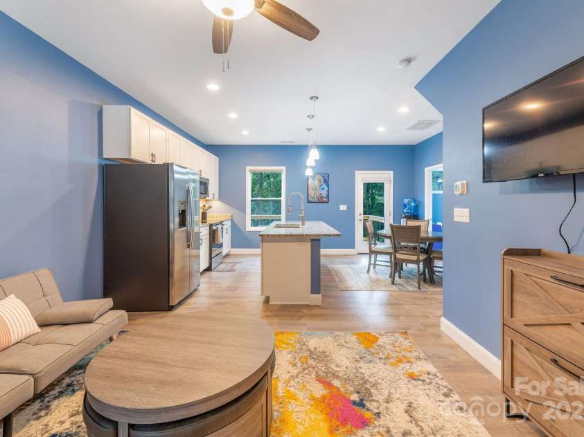 107 Mears Ridge Drive, Asheville, NC 28806.  MLS# CAR4274552, YatesRealty ID 32040. Open concept living, kitchen, and dining.