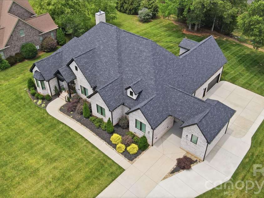 10035 Whispering Falls Avenue, Charlotte, NC 28227.  MLS# CAR4393646, YatesRealty ID 32047.  .75 of acre