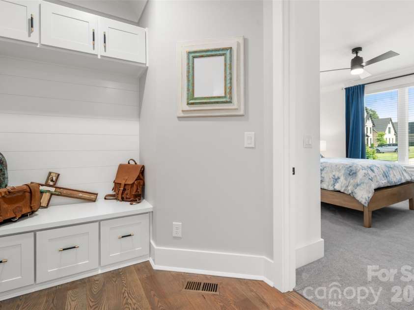 10035 Whispering Falls Avenue, Charlotte, NC 28227.  MLS# CAR4393646, YatesRealty ID 32047. A thoughtfully designed drop zone provides stylish and practical organization for everyday convenience.