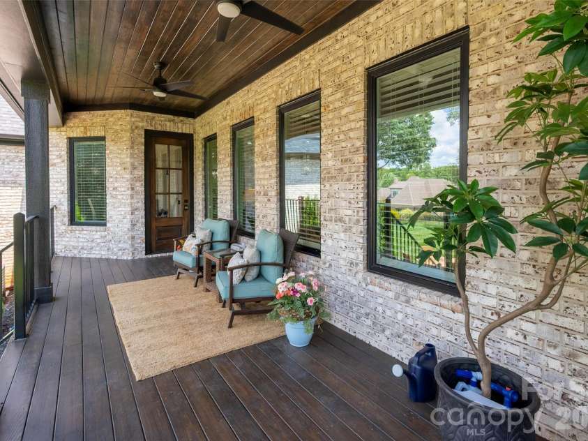 10035 Whispering Falls Avenue, Charlotte, NC 28227.  MLS# CAR4393646, YatesRealty ID 32047. Spacious covered deck