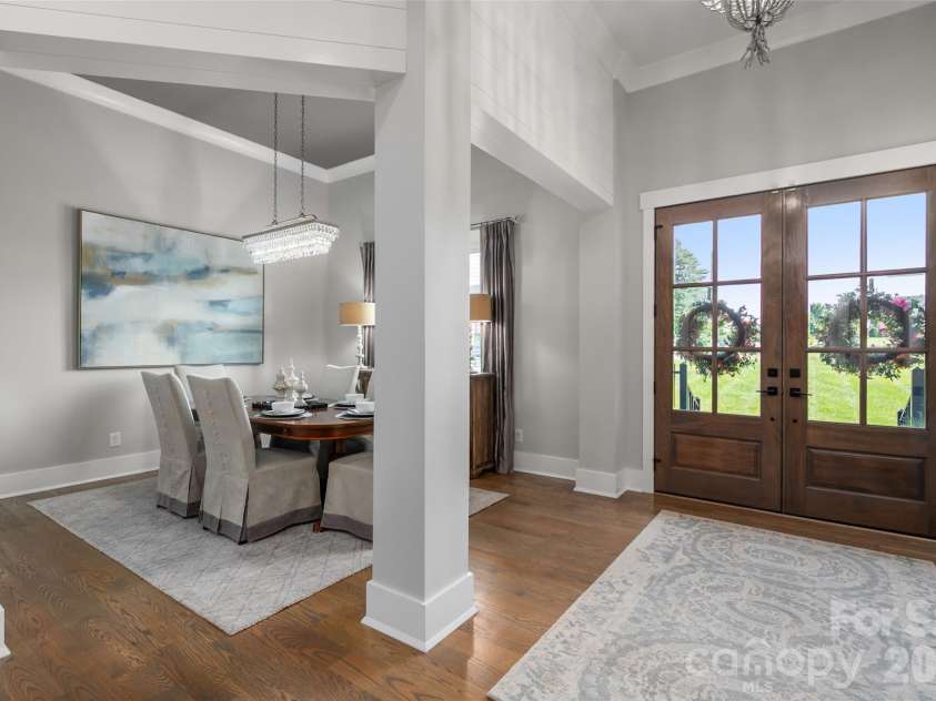 10035 Whispering Falls Avenue, Charlotte, NC 28227.  MLS# CAR4393646, YatesRealty ID 32047. The formal dining room provides an elegant setting for holiday gatherings, dinner parties, and memorable entertaining.
